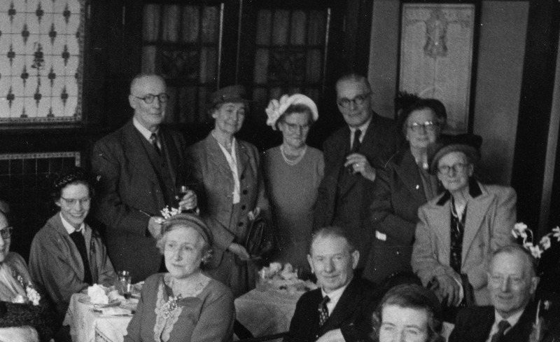 Members of the Archer family gathering for a meal, close-up of Fred, Em, Ethel and Harry